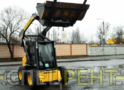 Услуги мини погрузчика NEW HOLLAND 470 NEW
HOLLAND 470